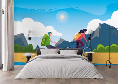 couple riding bike in the landscape Wall mural