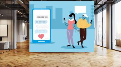 Young couple in love texting on the cell phone Wall mural