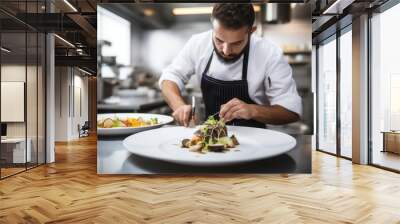 Male chef plating food in plate while working in commercial kitchen restaurant Wall mural