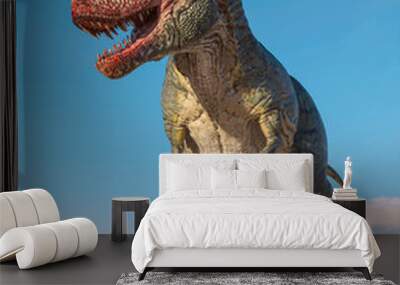 tyrannosaurus is in stand up pose on sunset desert Wall mural