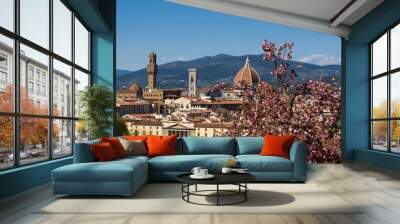 Cathedral of Saint Mary of the Flower (Cattedrale di Santa Maria del Fiore) and Judas Tree (European redbud) in the foreground. Florence, Tuscany, Italy. Wall mural