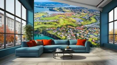 Aerial view on residential suburbs surrounded by sunny ocean harbour. Whangaparoa peninsula, Auckland, New Zealand Wall mural