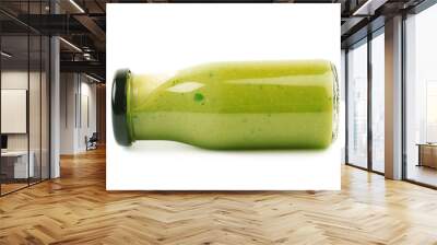 Green sauce in a bottle isolated Wall mural