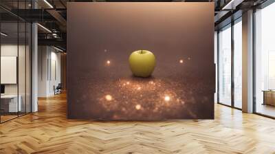 Yellow tasty organic apple fruit on a fancy brown mystic background. Fresh, natural, ecological clean eating Wall mural