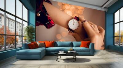 Stylish watch on woman hand Wall mural