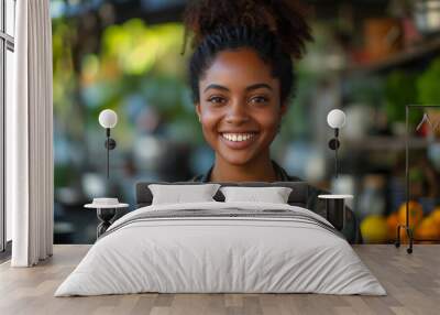 African girl cook with lovely smile cooking in professional kitchen Wall mural