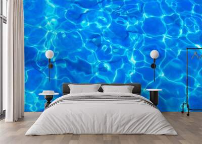 Blue clear water with rippled surface and sand bottom. Wall mural