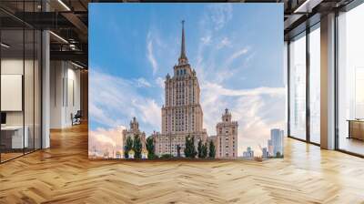 high-rise stalinist building near river at summer sunset in Moscow, Russia. Historic name is Hotel Ukraine. Wall mural