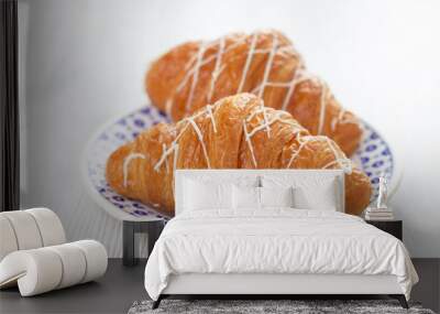 Two croissants on a plate Wall mural