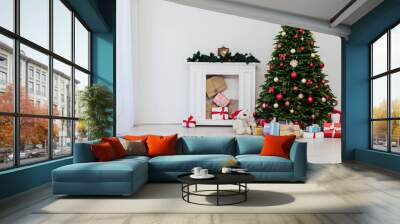 Christmas tree with gifts pine new year decor the interior of the white room of the house postcard Wall mural