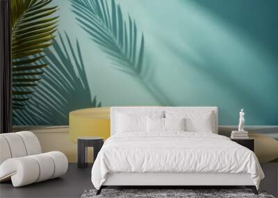 a yellow podium on a blue natural background with a palm leaf Wall mural