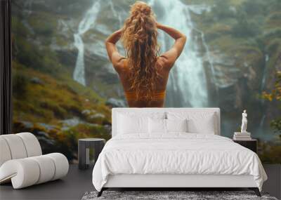 A young woman meditates outdoors, blending yoga with relaxation, promoting calm and concentration. Theme of the eco tourism and mental health rehabilitation. Wall mural