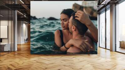 lovely couple kissing in the sea Wall mural