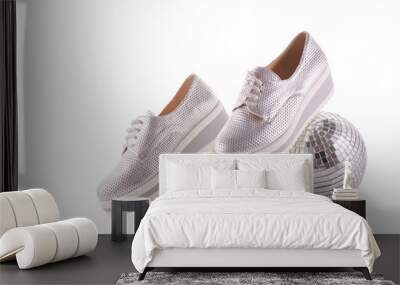 Silvery sneakers on white background.. Wall mural