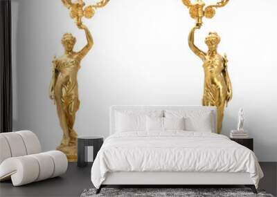 Two antique gold candlestick in the form of female figurines. Wall mural