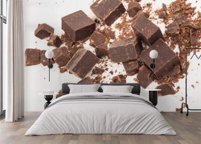 Broken chocolate on white background Wall mural