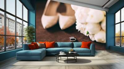 wedding decor with shoes and rings. Wall mural