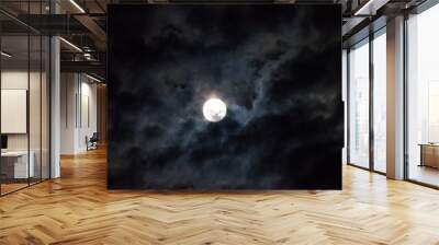 Moon through the clouds at night, super moon Wall mural