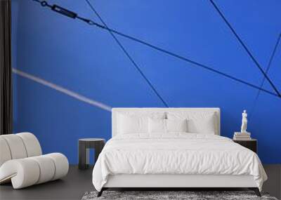 High voltage wires against blue sky Wall mural