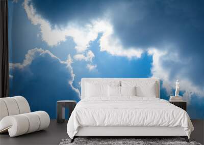 Beautiful blue sky and clouds. Beams of light. The natural background. Texture. Wall mural