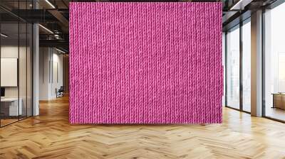 Closeup pink texture of woolen knitted fabric. Pattern of pink fabric. Wall mural