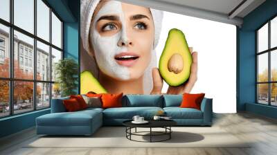 Beautiful young woman with facial mask and fresh avocado on white background. Beauty skin care Wall mural