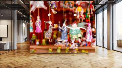 Fairytale character Christmas baubles for sale at Christmas market stall in Berlin Germany Wall mural