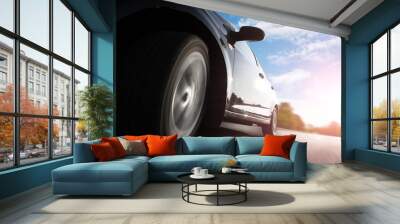 car on the road with motion blur background. Wall mural