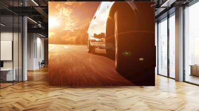 Front side view of black car driving fast Wall mural