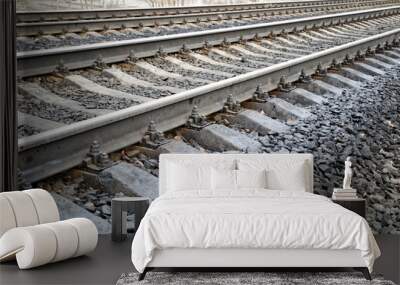 railway wooden sleepers. fastening the rails to the sleepers with bolts. Wall mural