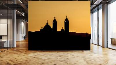 silhouette of the Coptic church on sunset background Wall mural