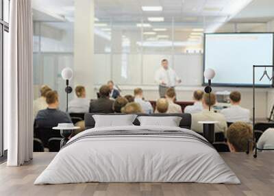 the audience listens to the acting in a conference hall Wall mural