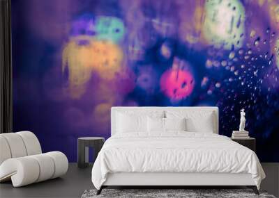 Abstract circular bokeh background of night light with raindrops Wall mural