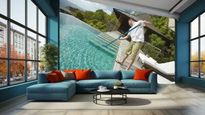 swimming pool cleaner, professional cleaning service at work. Wall mural