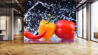 Wet red and yellow pepper closeup. Macro water drops Wall mural