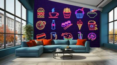 A set of neon glowing bright icons of fast food for a restaurant, cafe, bar and snack bars on a brick wall background in the colors blue, green, yellow and red. Wall mural