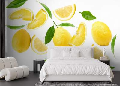 flying lemons with slices and green leaves isolated on white background. clipping path Wall mural