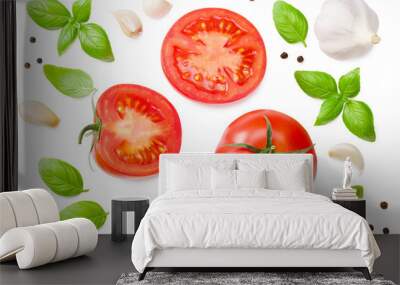 fresh tomato slices with garlic and basil leaves isolated on white background. top view Wall mural