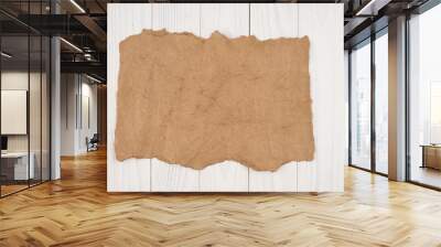 Crumpled paper on a white wooden background. Wall mural