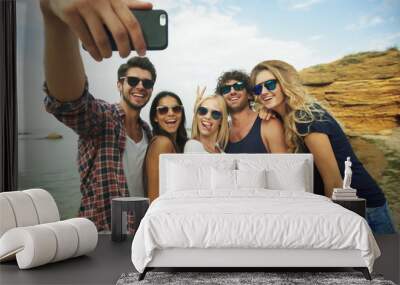 five friends taking selfies . Wall mural