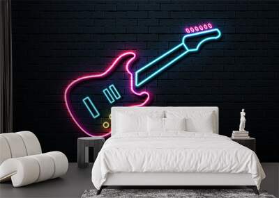 Neon guitar on the background of a brick wall. Retro signboard. Wall mural