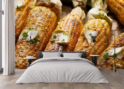 Grilled sweet corn cobs with butter seasoned with cilantro closeup low angle view Wall mural