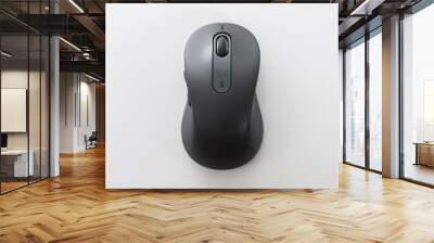 Black computer mouse on the blue background. Wall mural