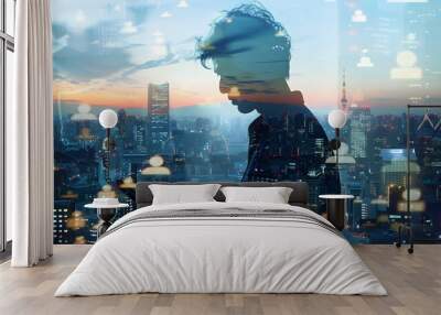 Double exposure of a businessman on his mobile phone and a city landscape Wall mural