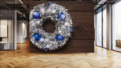 Christmas wreath on wooden surface Wall mural