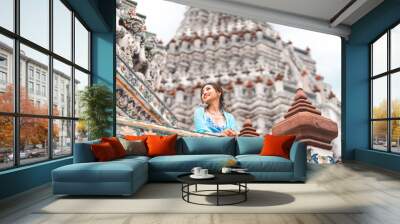 Asian woman standing at Wat Arun temple travel in Bangkok Thailand Southeast asia destination Wall mural