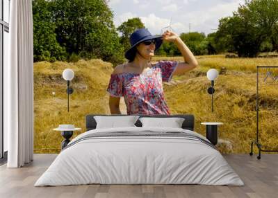 beautiful woman in a field in ancient city, turkey Wall mural