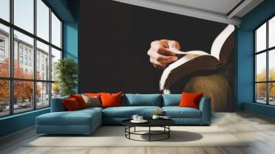 a christian man reading the bible. Wall mural