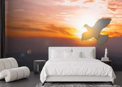 Doves fly in the sky. Christians have faith in Holy Spirit. silhouette worship to god with love Faith, Spirit and jesus christ. Christian praying for peace. Concept of worship in Christianity. Wall mural