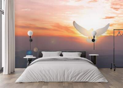 Doves fly in the sky. Christians have faith in Holy Spirit. silhouette worship to god with love Faith, Spirit and jesus christ. Christian praying for peace. Concept of worship in Christianity. Wall mural